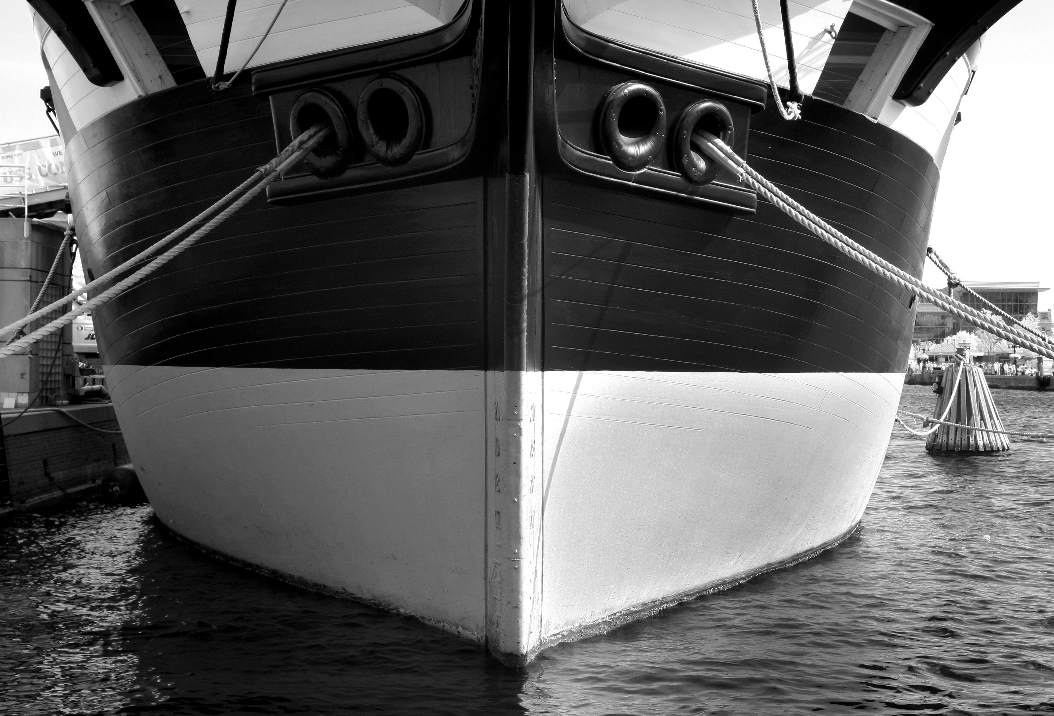 Sailing yacht viewed from astern with the bow ahead, port side to the left and starboard side to the right